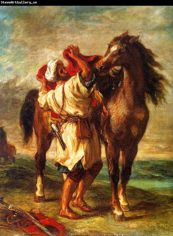 Eugene Delacroix Arab Saddling his Horse